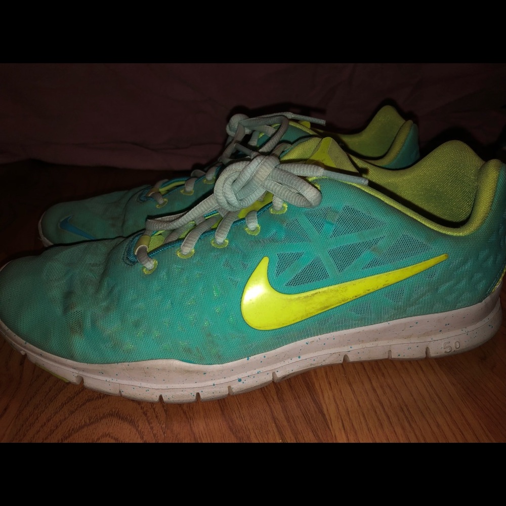 Bright blue and neon yellow Nike running shoes